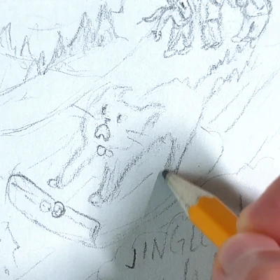 hand drawing a cat on a sled